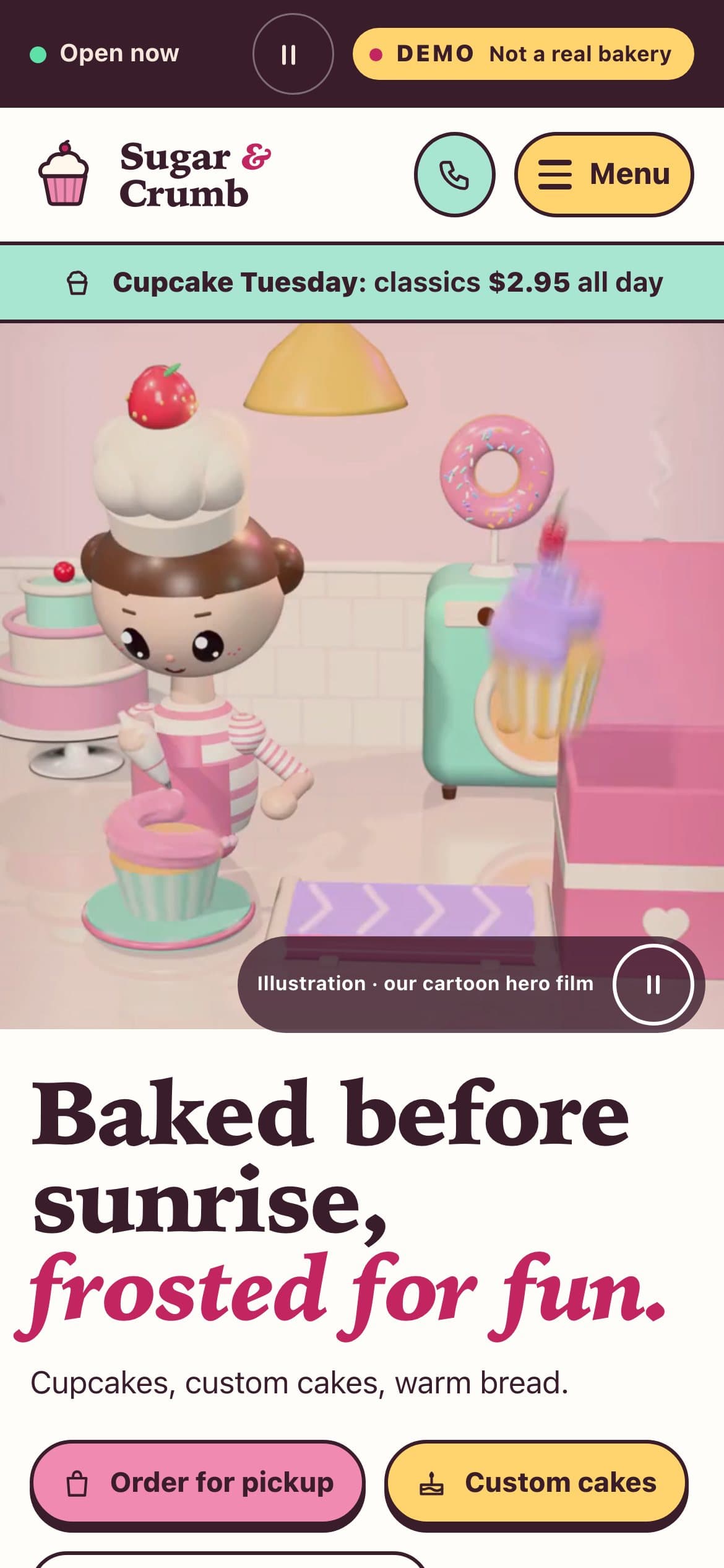 Sample bakery website on a phone The same sample bakery website on a phone: a cartoon baker piping a cupcake under the words Baked before sunrise