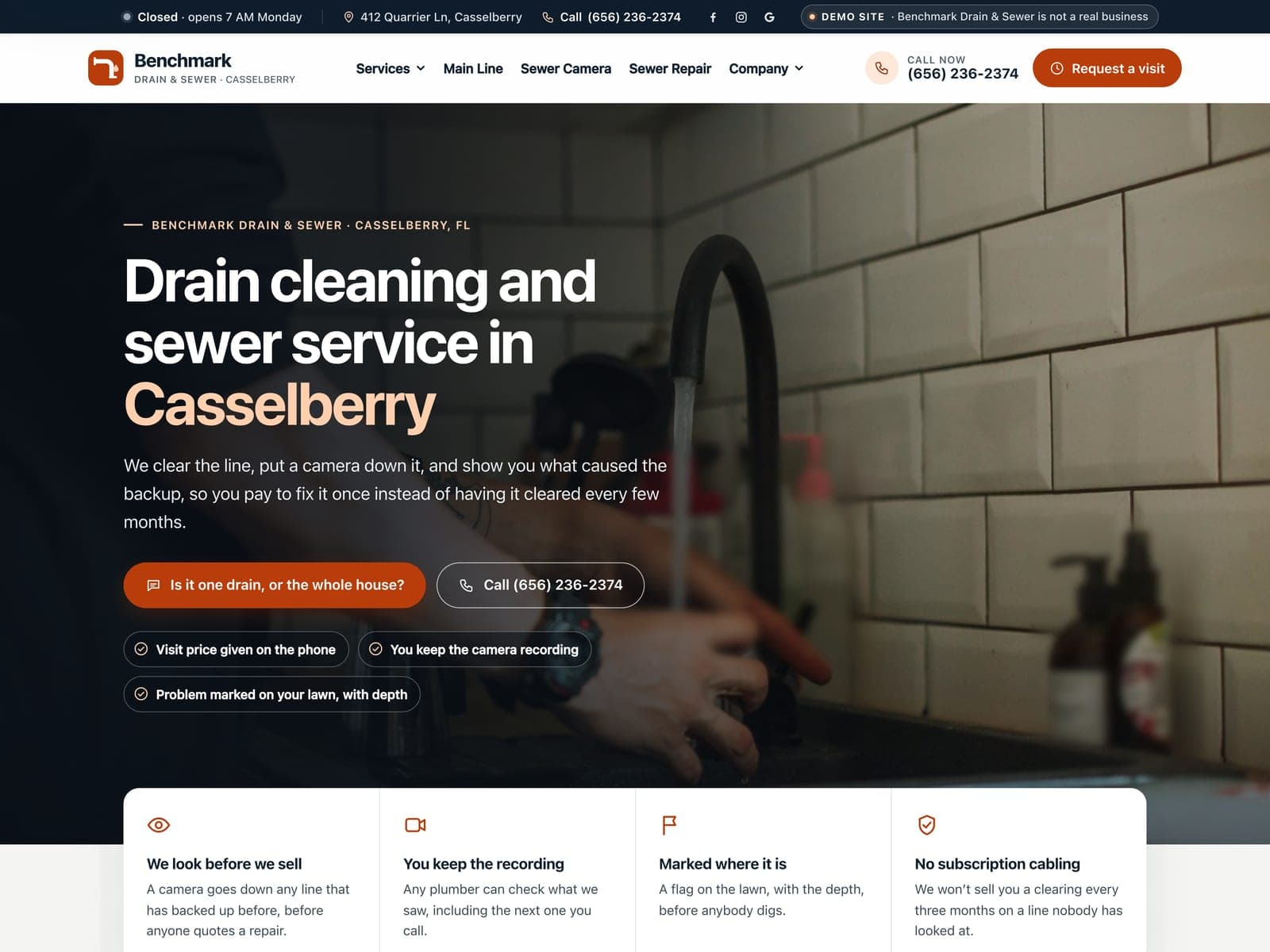 Benchmark Drain & Sewer, a sample drain cleaning website we built, on a laptop