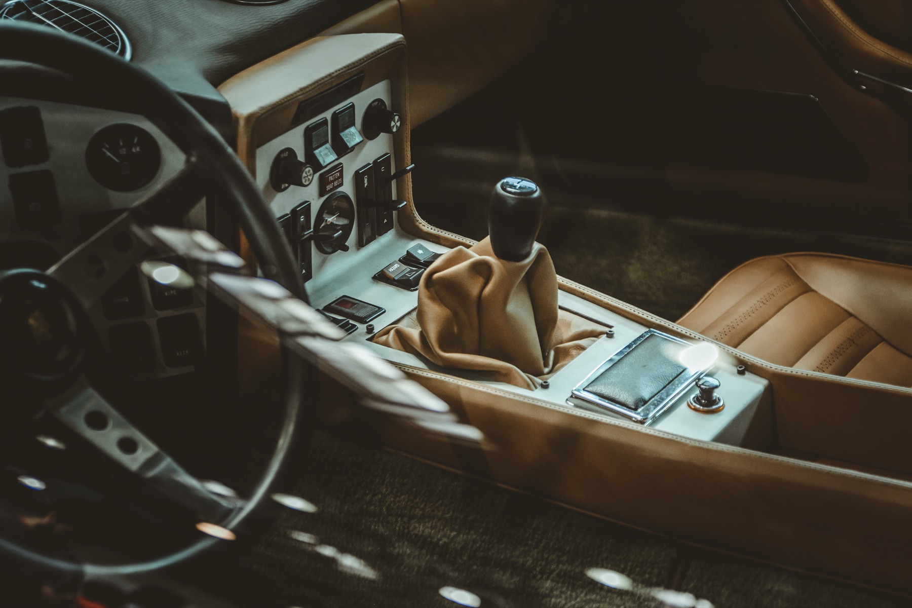 The leather interior of a car, seats and console