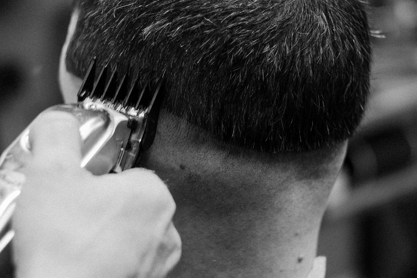 Clippers with a guard running up a tapered neckline, in black and white