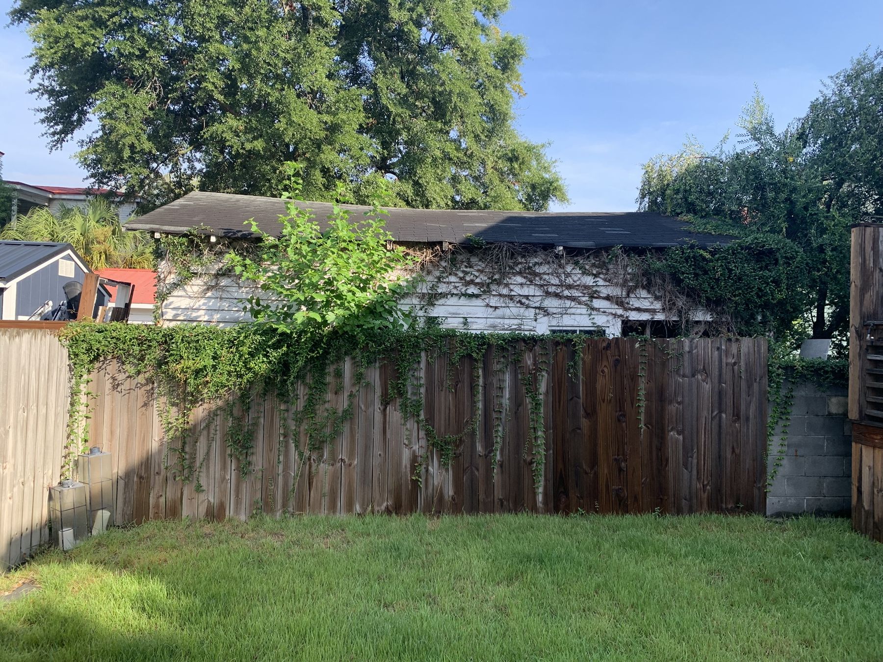 A detached garage beside a house