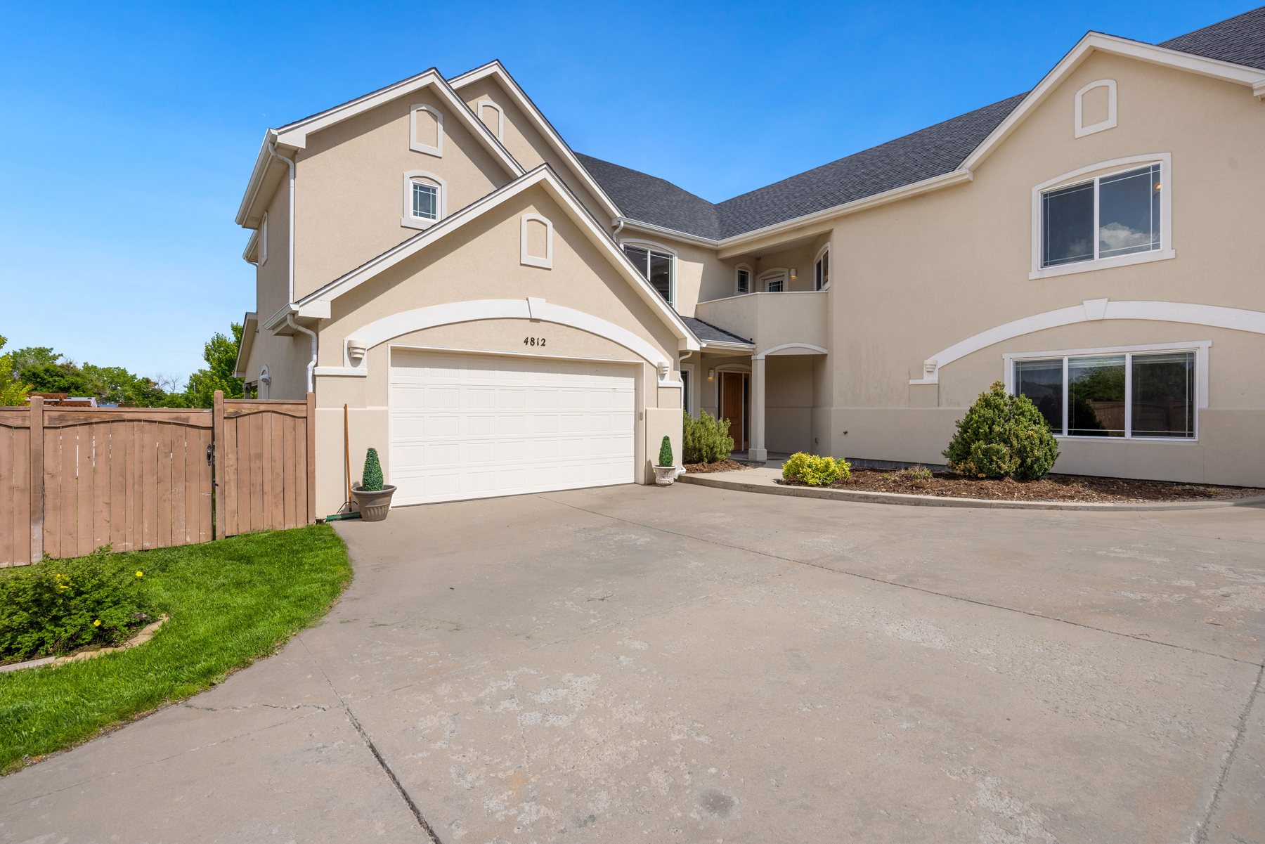 A garage door on the front of a family home