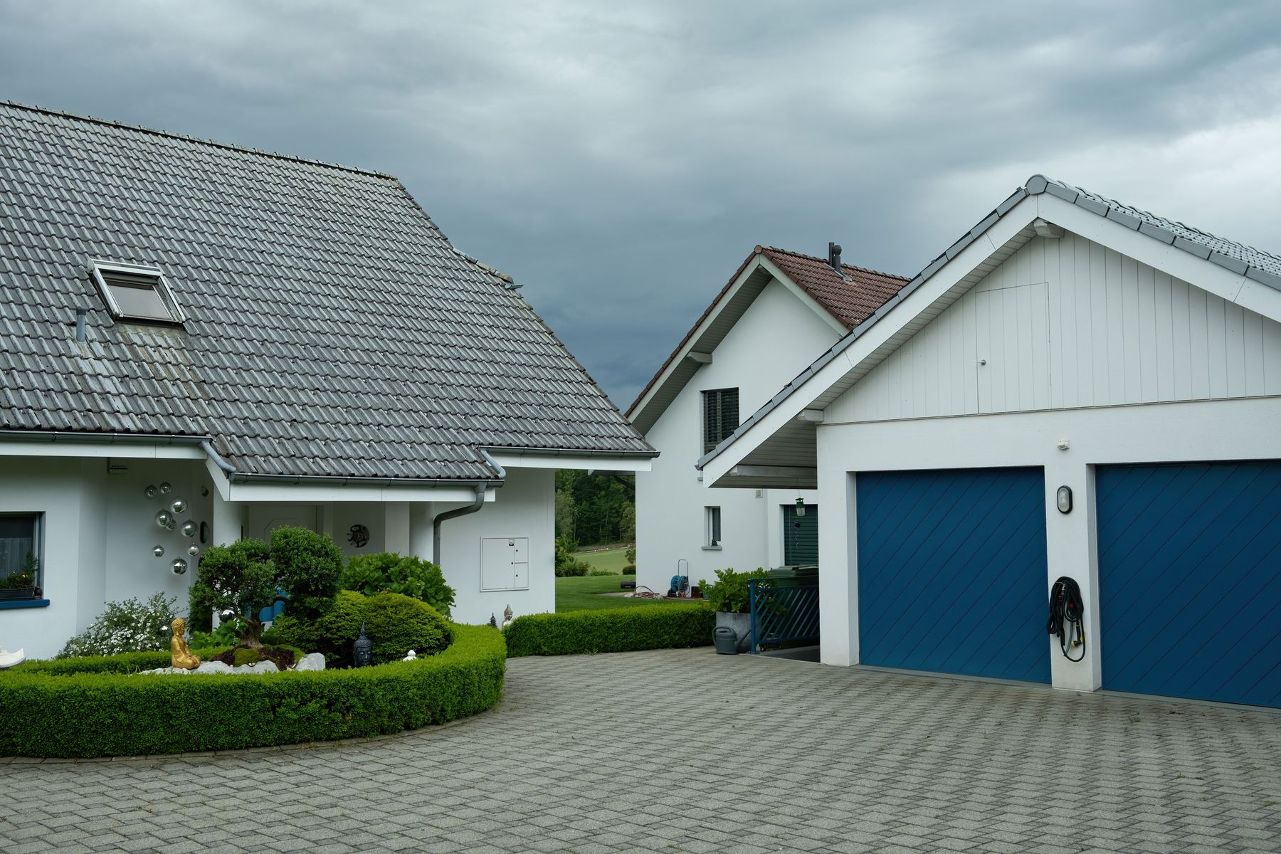 A residential driveway running to the street