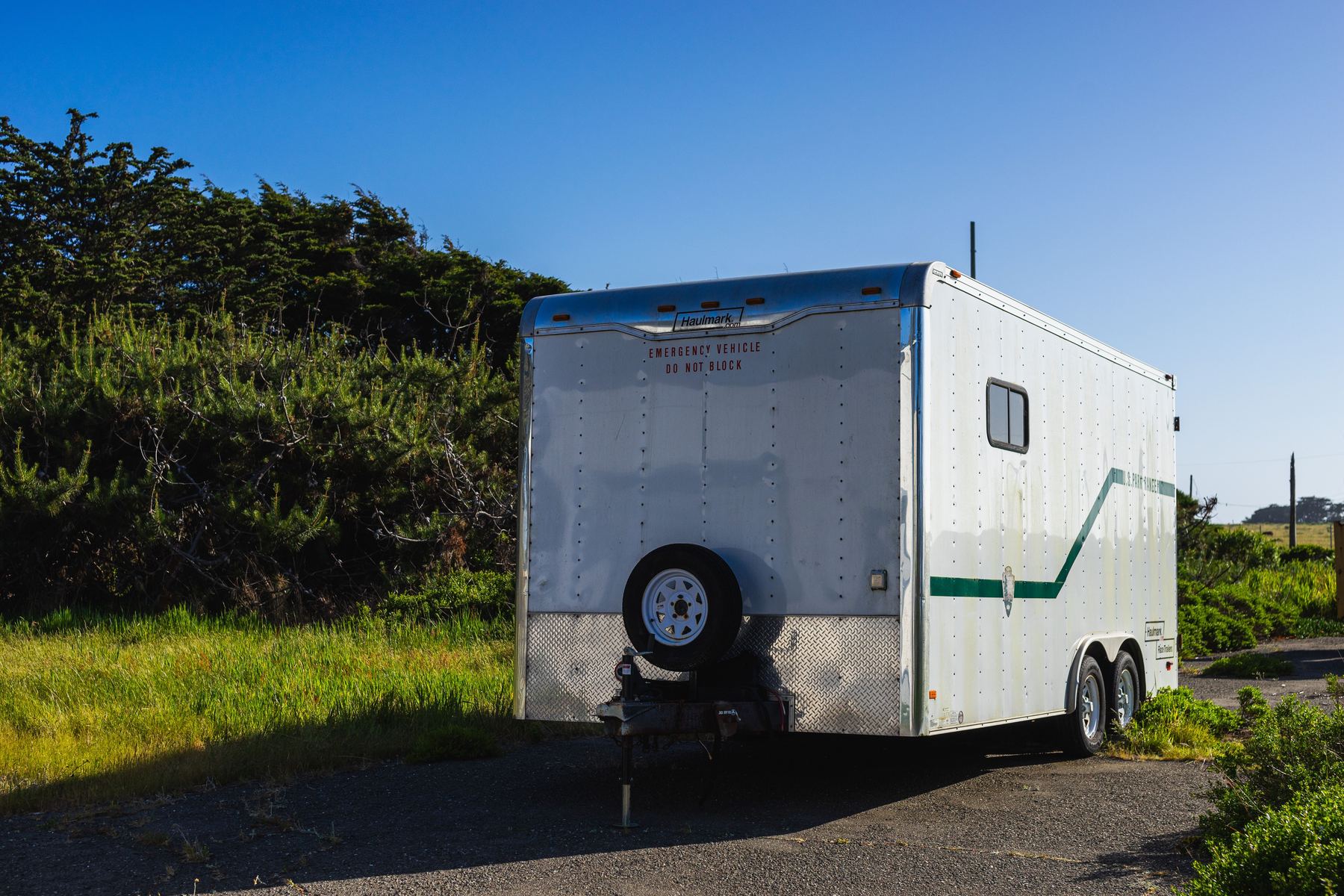 An RV pulled into a home garage bay