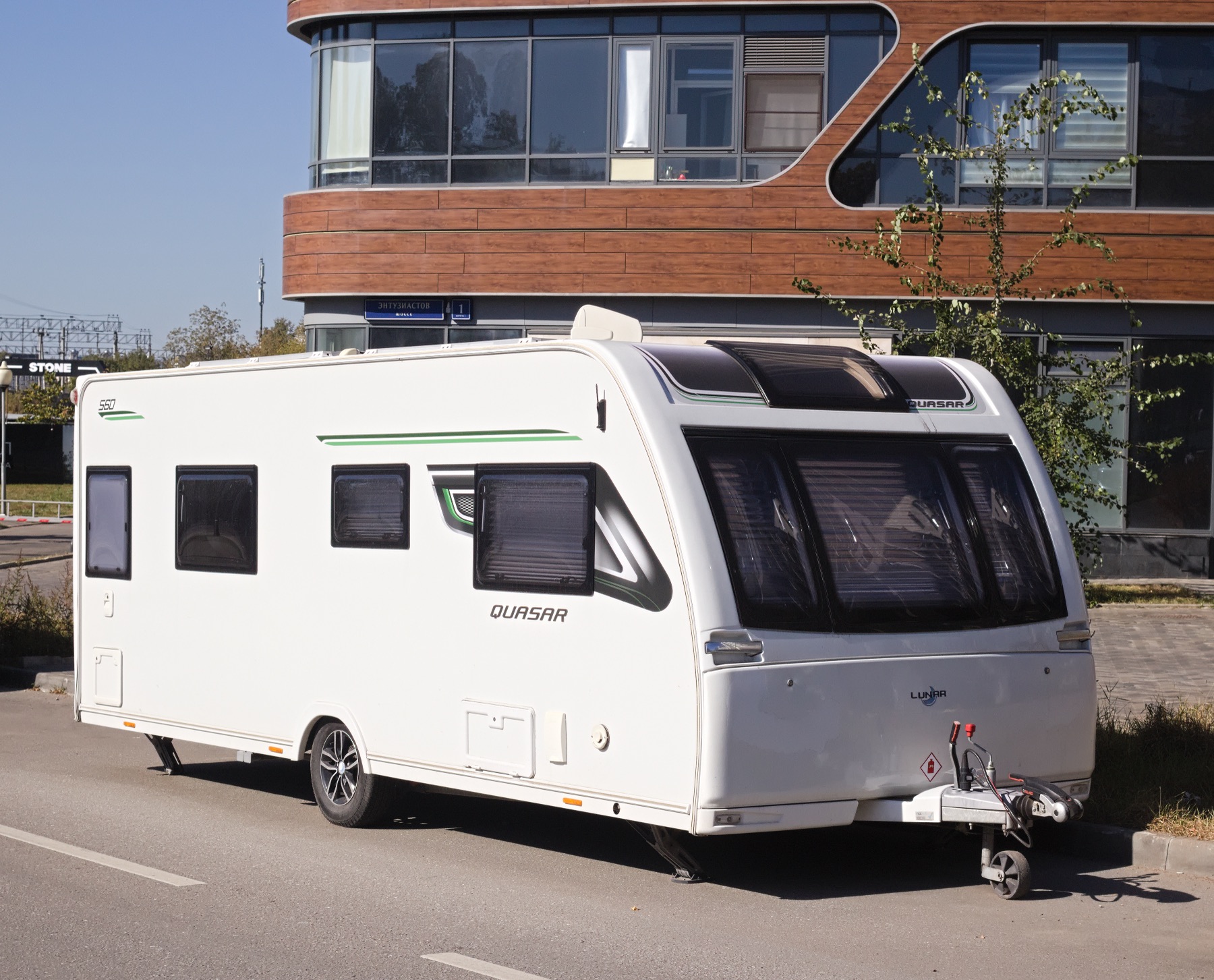 A caravan trailer parked on a pitch